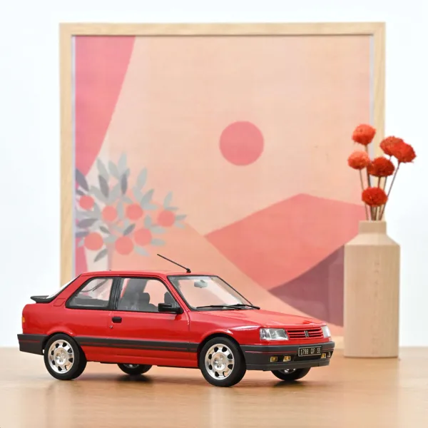 Norev Peugeot 309 GTi 1987 Rouge Vallelunga 1:18 scale diecast model car
