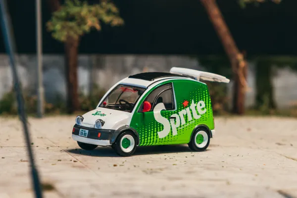 Tarmac Works Nissan S-Cargo Sprite 1:64 scale diecast model car